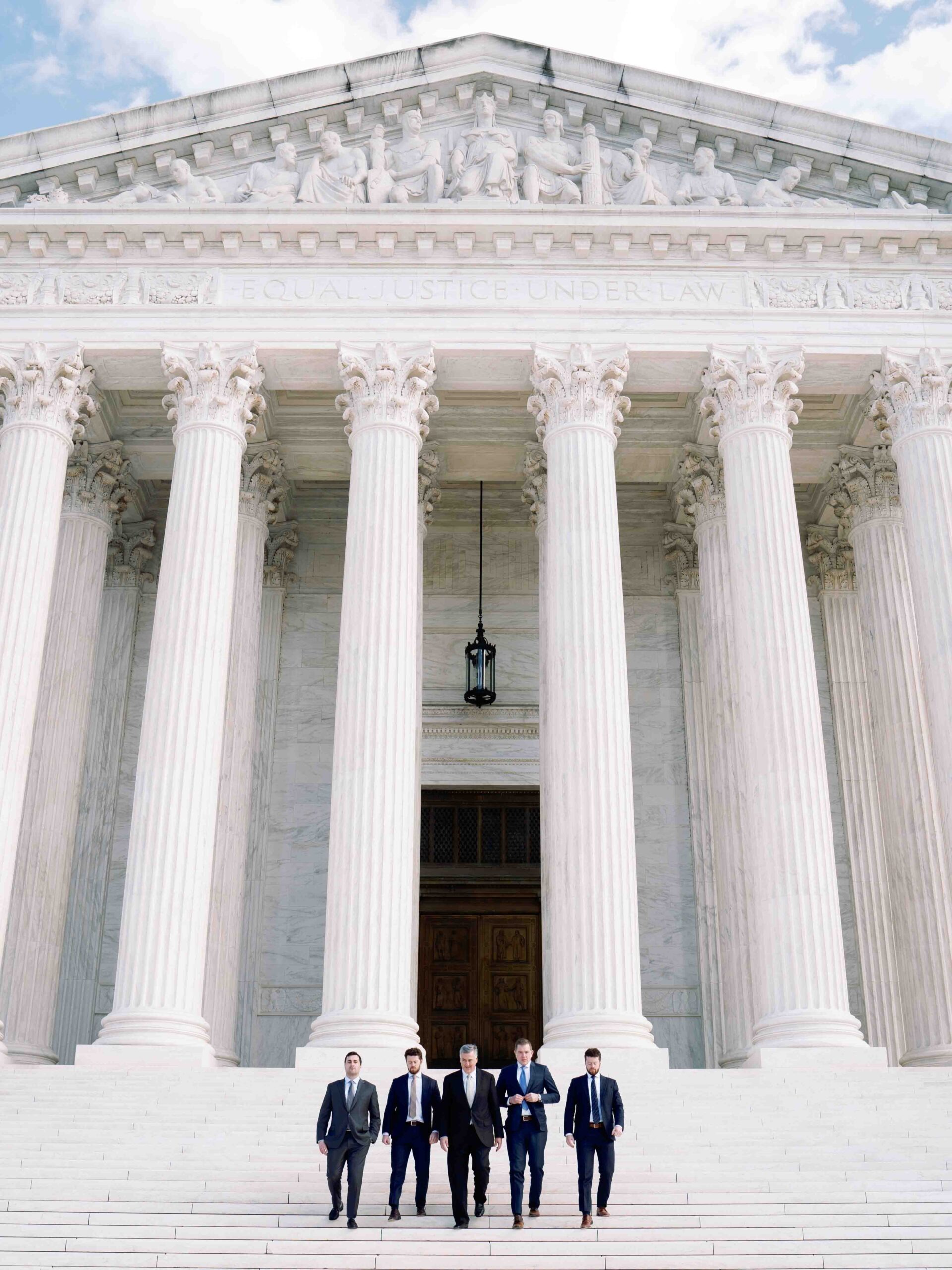 The Valente Law Group in front of the United States Supreme Court building in Washington, DC